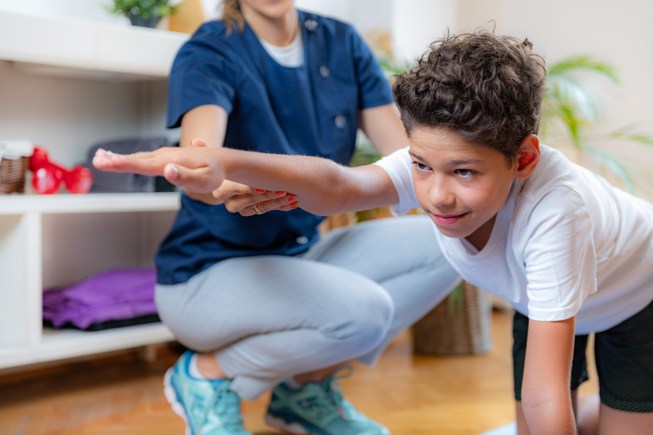 Child training with physical therapist for balance improvement Child training with physical therapist for balance improvement